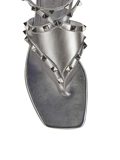 Shop Valentino Rockstud Sandal In Metallic