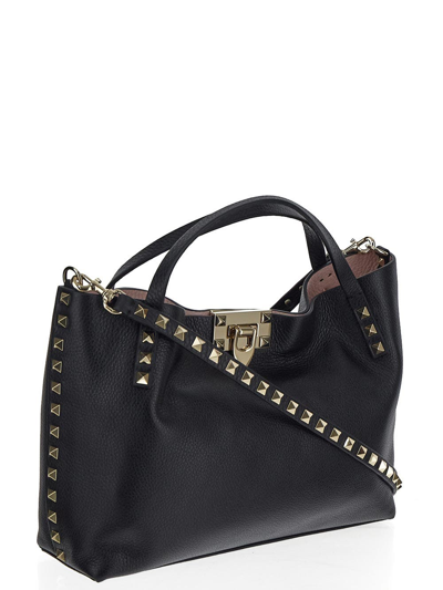 Shop Valentino Rockstud Bag In Black