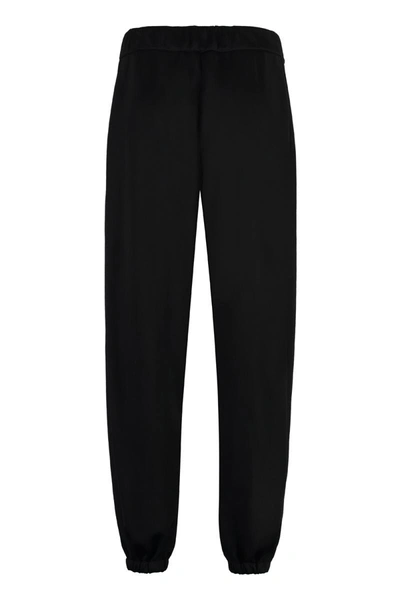 Shop Jil Sander High-waist Tapered-fit Trousers In Black