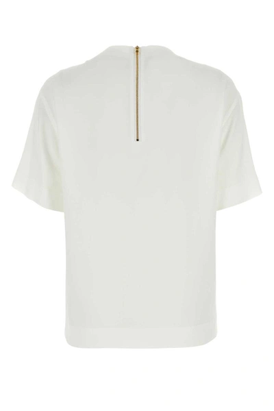 Shop Moschino T-shirt In White