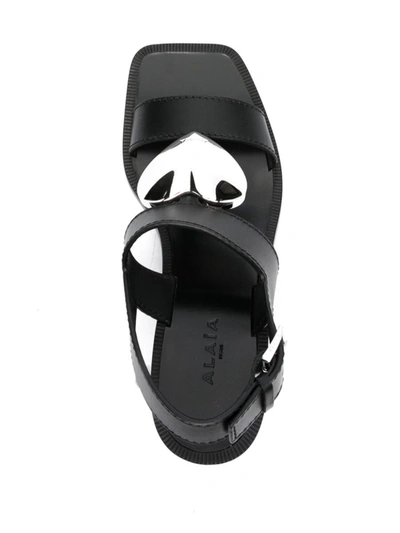 Shop Alaïa Alaia Sandals In Black