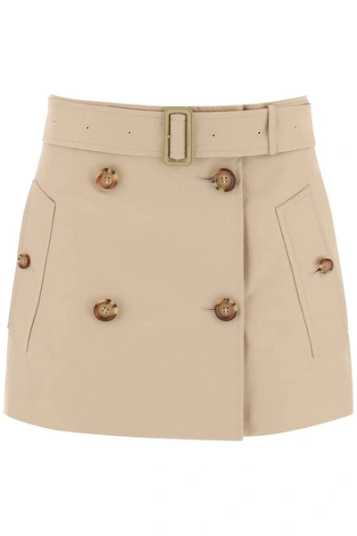 Shop Burberry Gabardine Mini Trench Skirt In Beige