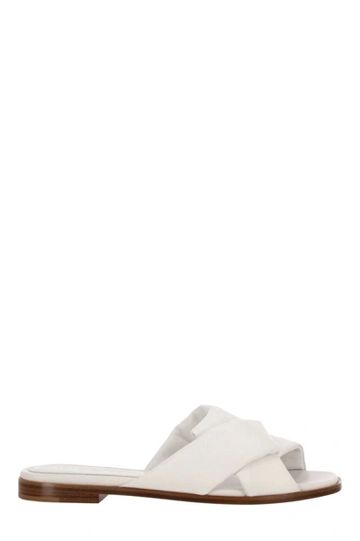 Shop Ferragamo Flat Shoes In White