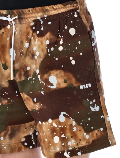 Shop Msgm Dripping Camo Shorts In Camouflage