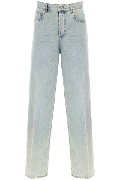 Shop Valentino Garavani Oversized Jeans With V Detail In Blue