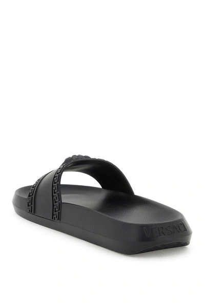 Shop Versace 'palazzo' Rubber Slides In Black