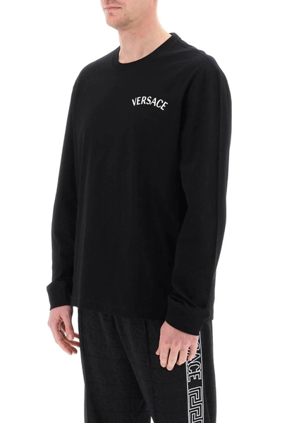 Shop Versace Milano Stamp Long-sleeved T-shirt In Black