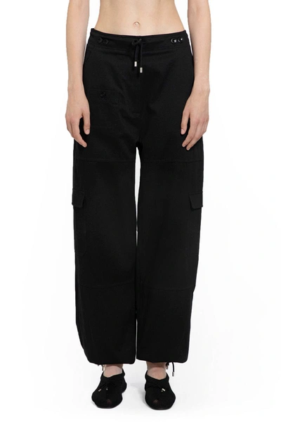 Shop Totême Trousers In Black