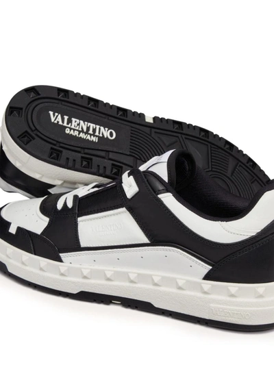 Shop Valentino Garavani Freedots Leather Sneakers In Black