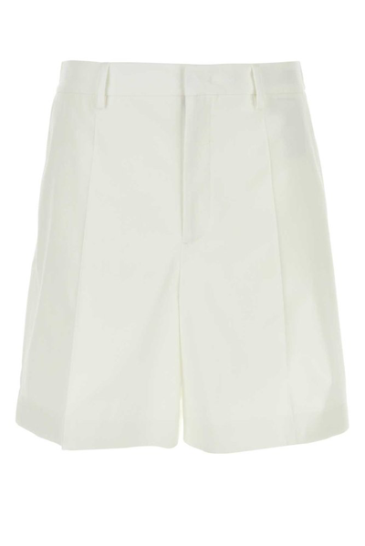 Shop Valentino Pleated Bermuda Shorts In White