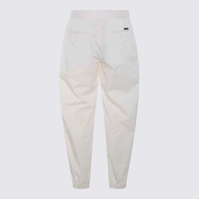 Shop Dolce & Gabbana Cream Cotton Pants In White