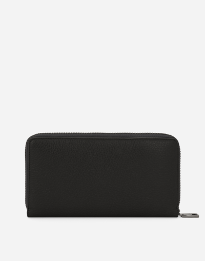 Shop Dolce & Gabbana Zip-around Dg Logo Wallet In Black