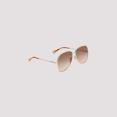 Shop Chloé Sunglasses In Gold Gradient Brown