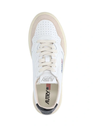 Shop Autry Sneakers In White