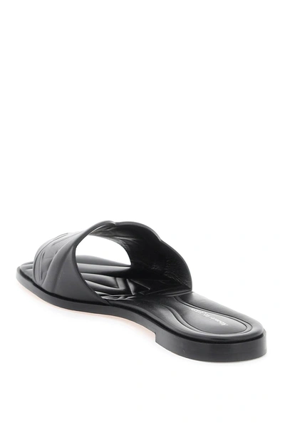 Shop Alexander Mcqueen Leather Slides With Embossed Seal Logo Women In Black