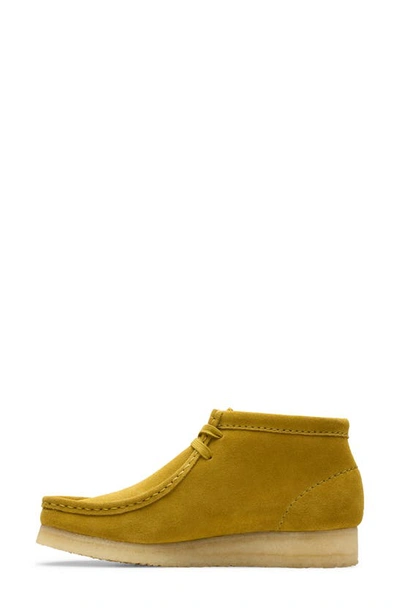 Shop Clarks Wallabee Chukka Boot In Olive Suede
