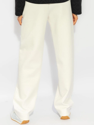 Shop Ea7 Emporio Armani Trousers In Bianco Caldo