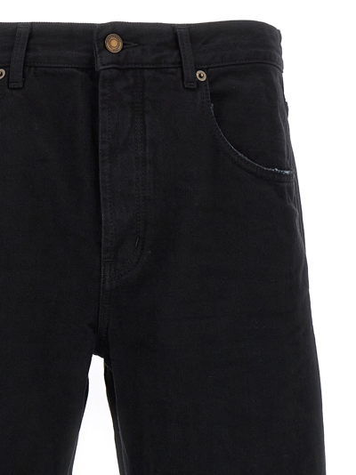 Shop Saint Laurent Wide Leg Jeans In Black
