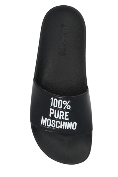 Shop Moschino Logo-embossed Slides In Black