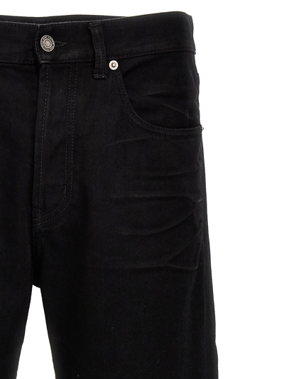 Shop Saint Laurent Crinkled Effect Jeans In Black