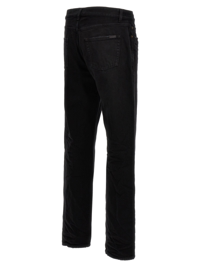 Shop Saint Laurent Straight Fit Jeans In Black