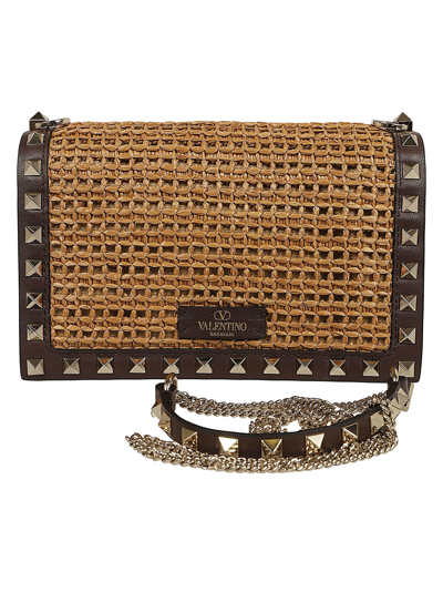 Shop Valentino Pouch Rockstud In T Tabacco Cacao