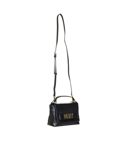 Shop Dkny Shoulder Bag In Black/gold
