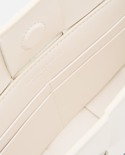 Shop Bottega Veneta Cassette Pouch W/ Strap Leather Shoulder Bag In White