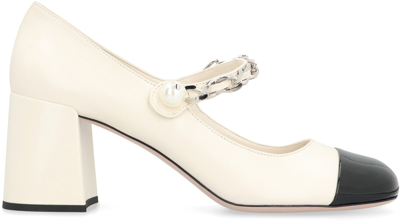 Shop Miu Miu Leather Pumps In Ivory