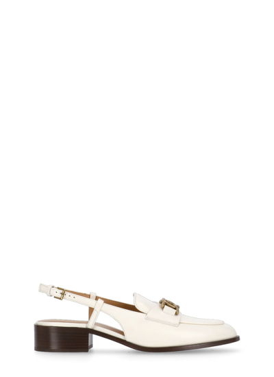 Shop Tod's Leather Mules In Ivory