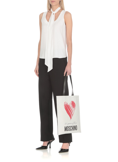 Shop Moschino 40 Years Of Love Bag In White