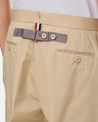 Shop Thom Browne Backstrap Trousers In Beige