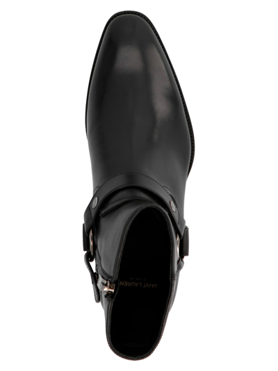 Shop Saint Laurent Wyatt Ankle Boots In Black