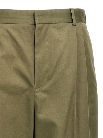 Shop Loewe Central Pleated Trousers In Green