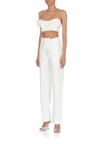 Shop Agolde Criss Cross Jeans In White