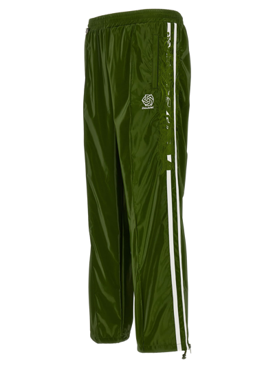 Shop Doublet Laminate Track Joggers In Green
