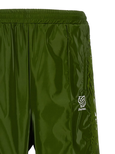 Shop Doublet Laminate Track Joggers In Green