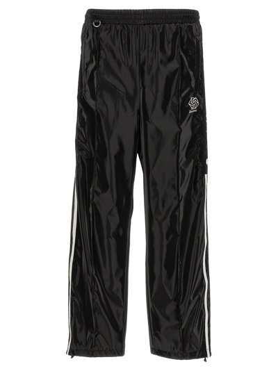 Shop Doublet Laminate Track Joggers In White/black