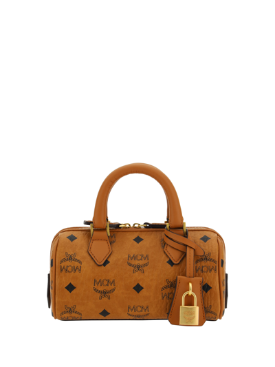Shop Mcm Ella Boston Handbag In Cognac
