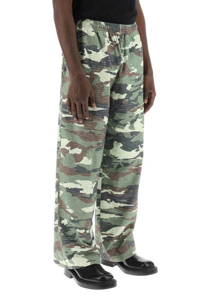 Shop Acne Studios Camouflage Jersey Pants For Men