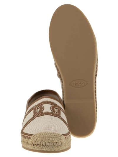 Shop Tod's Slip On Kate In Canvas And Leather