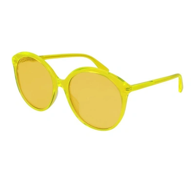 Shop Gucci Gg0257s Sunglasses In Yellow
