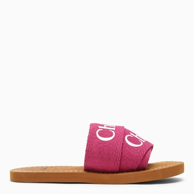 Shop Chloé Pink Flat Sandals Woody With Logo