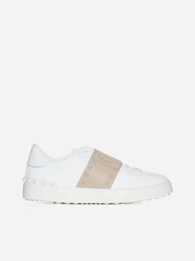 Shop Valentino Rockstud Untitled Leather Sneakers In White,rock Beige