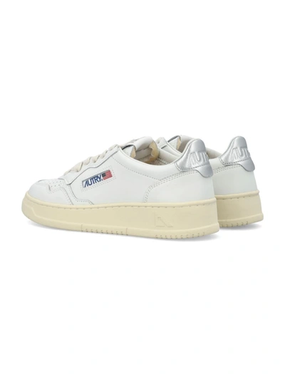 Shop Autry Medalist Low Woman Sneakers In White Silver