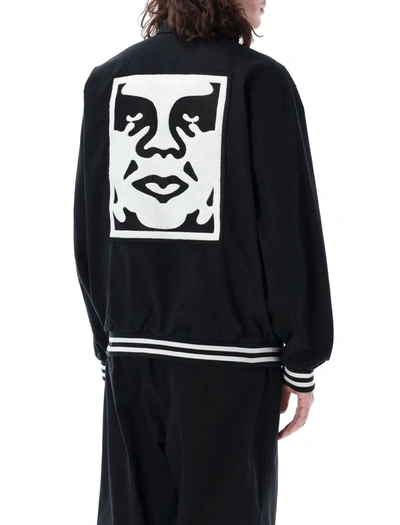Shop Obey Icon Face Varsity Jacket In Black