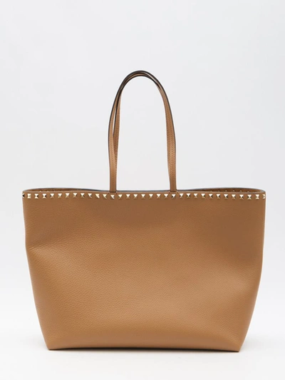 Shop Valentino Rockstude Tote Bag In Brown