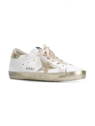 Shop Golden Goose White And Gold Superstar Sneakers