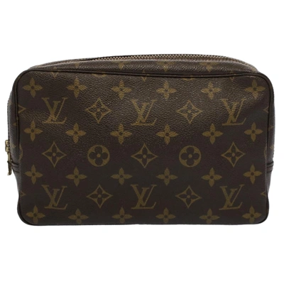 Pre-owned Louis Vuitton Trousse Toilette 28 Canvas Clutch Bag () In Brown