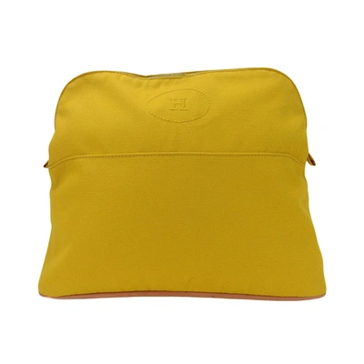 Shop Hermes Bolide Canvas Clutch Bag () In Yellow